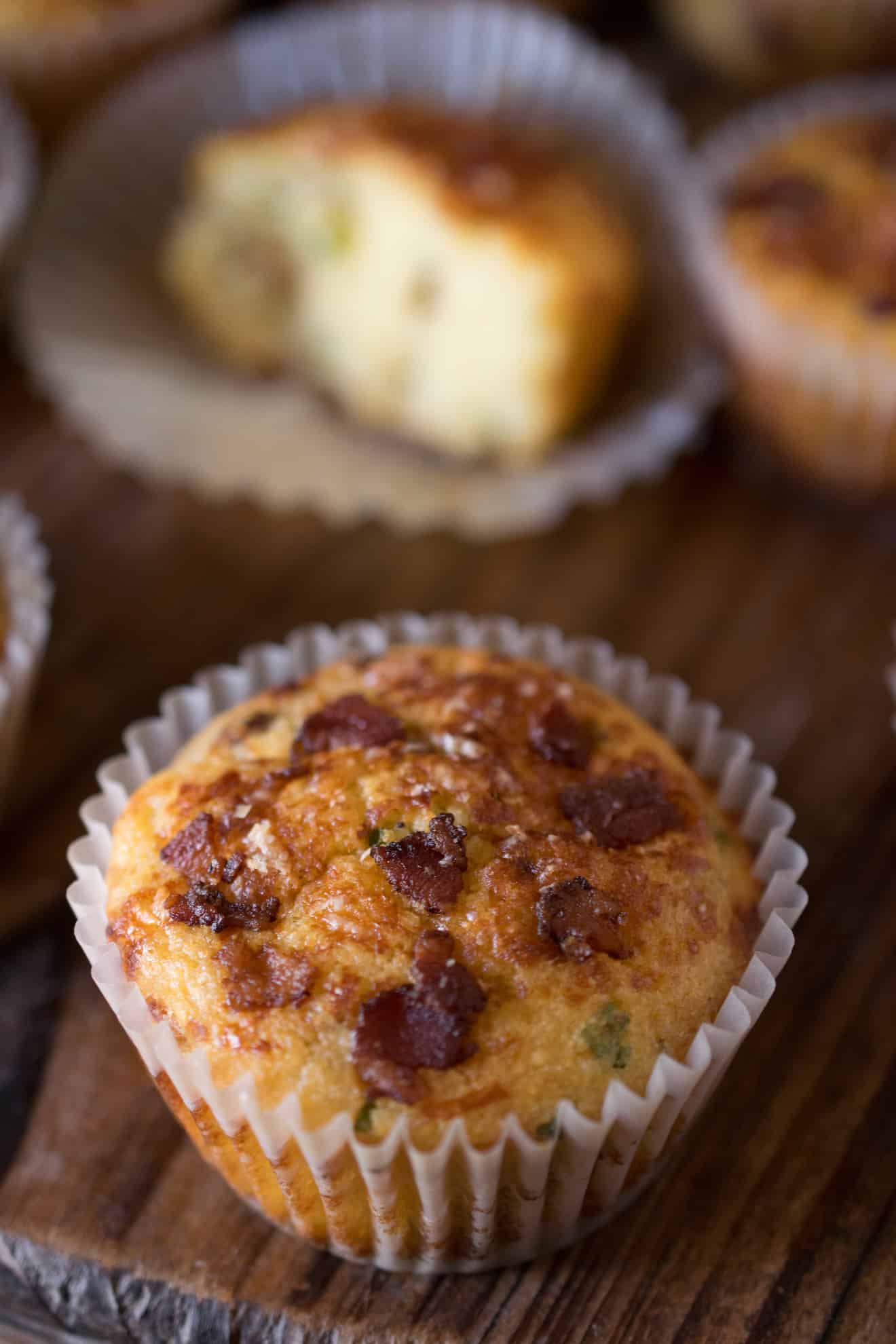 A closeup showing the bacon topping on the muffin