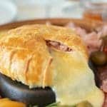 Melted brie oozing out of puff pastry