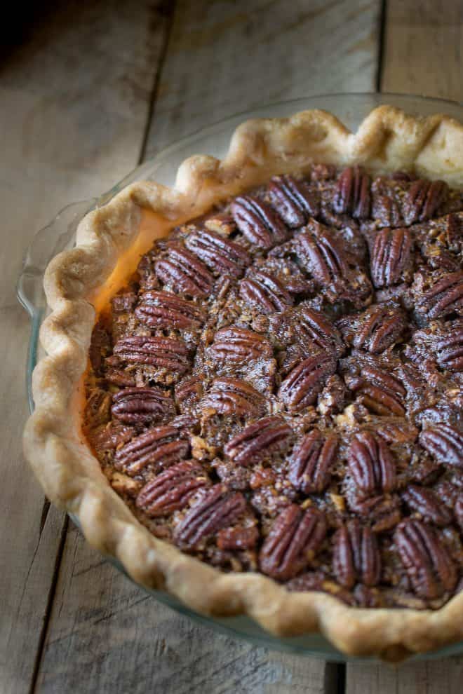 Bourbon Pecan Pie A closeup of Bourbon Pecan Pie showing the browned crust and pecan topping
