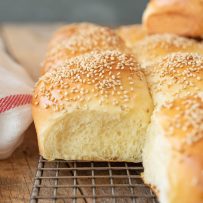 A closeup of a bread rolls showing the soft and fluffy inside