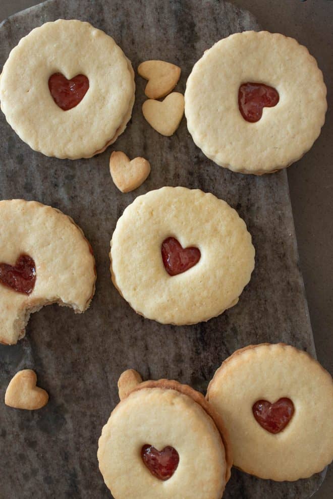 A selection of the cookies and 1 has a bite taken out