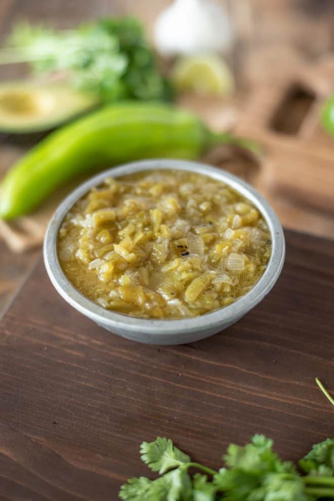 A pewter bowl filled with New Mexico Hatch Green Chile Sauce