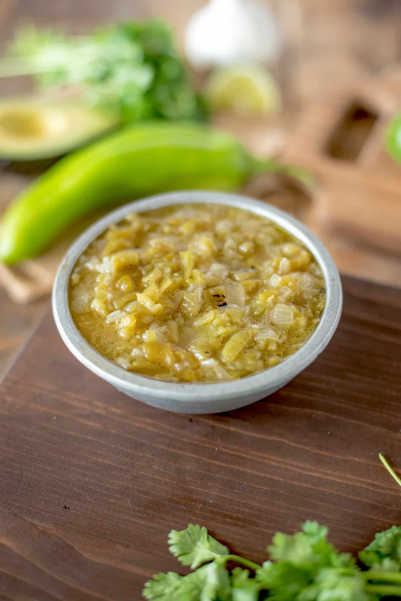 A grey bowl full of New Mexico Hatch Green Chile Sauce