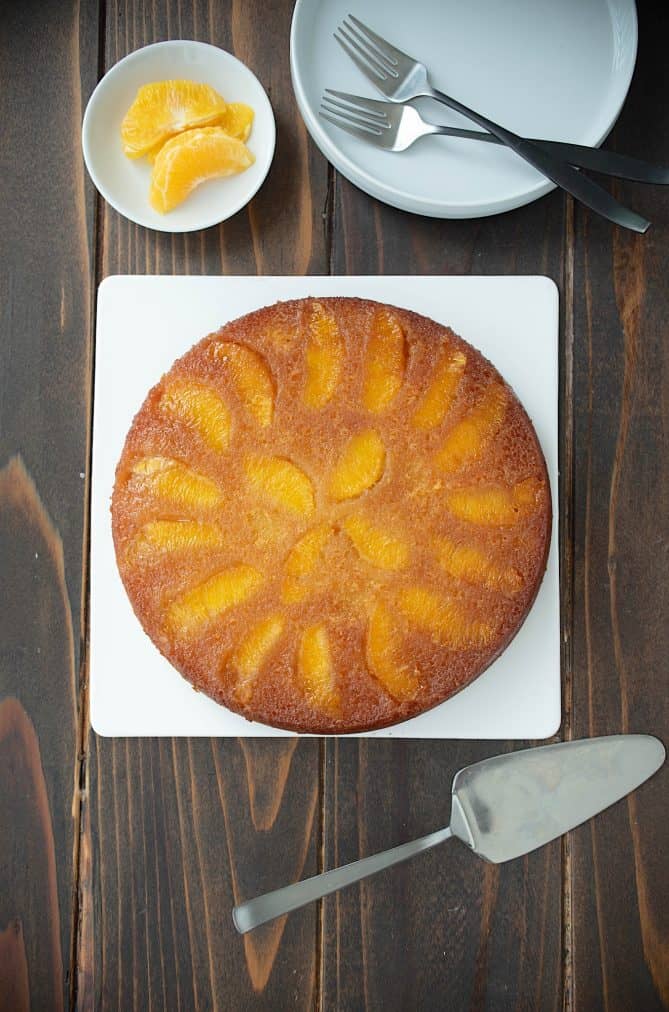 The cake viewed from overhead showing the orange segments on top