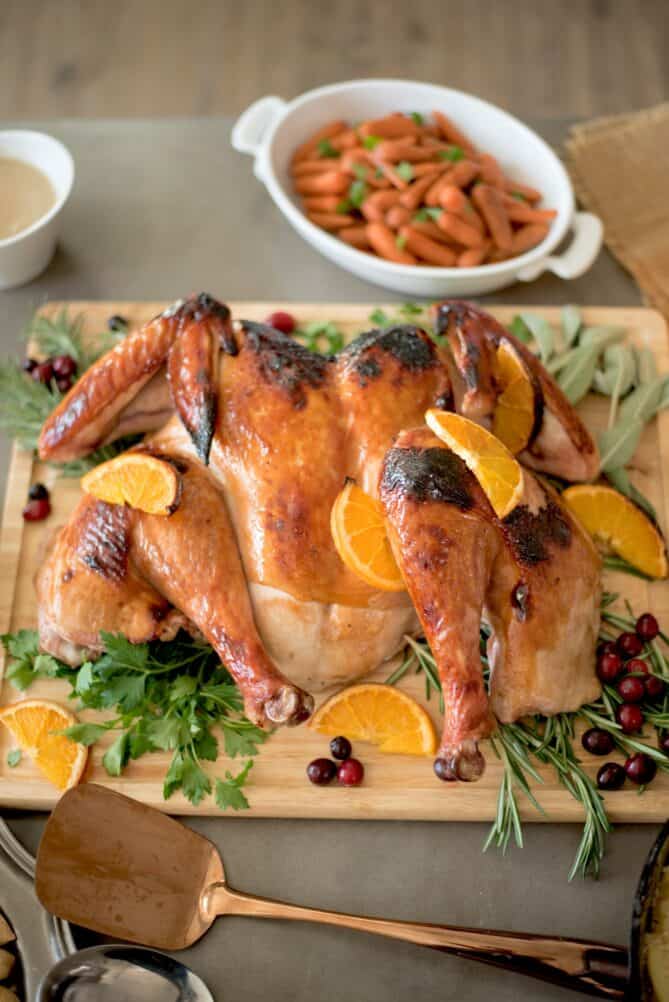 A whole turkey, cut open and flat on a cutting board