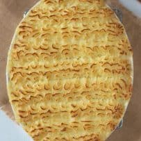 British fish pie in an oval dish topped with mashed potato