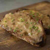 Melted cheese sauce on sliced bread