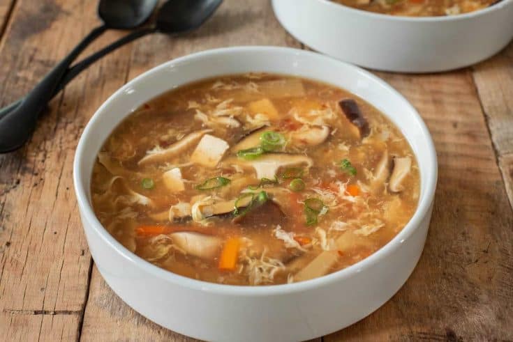 A white bowl filled with vegetarian Chinese hot and sour soup